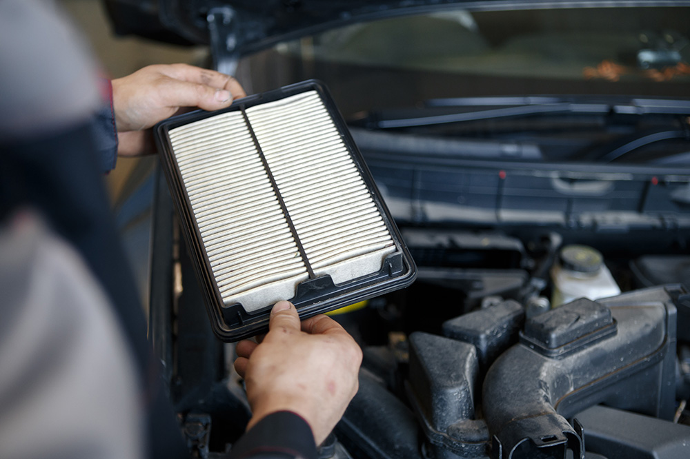 Changing engine air filter as part of Honda service schedule