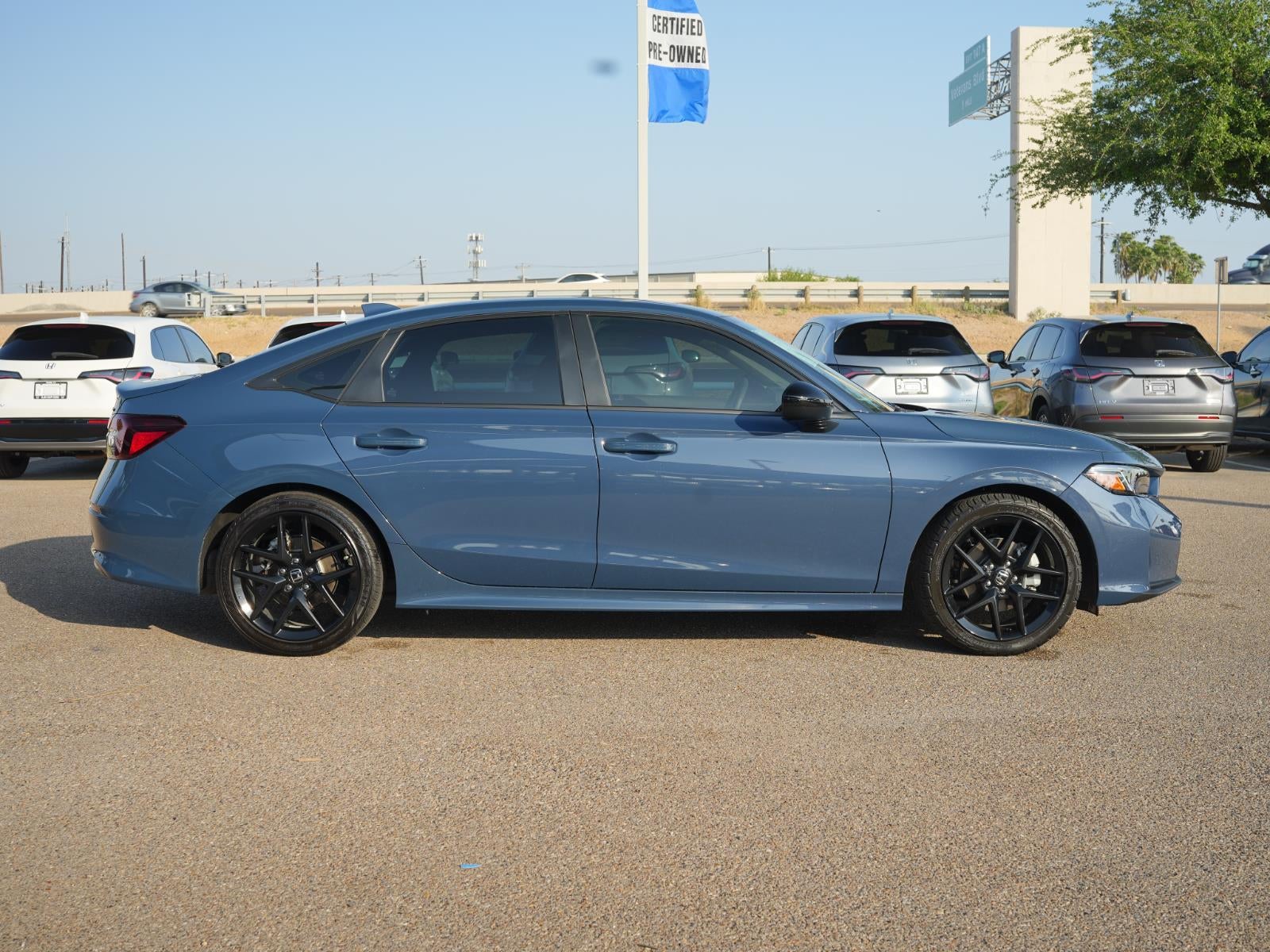 2026 Honda CIVIC SEDAN HYBRID SPORT