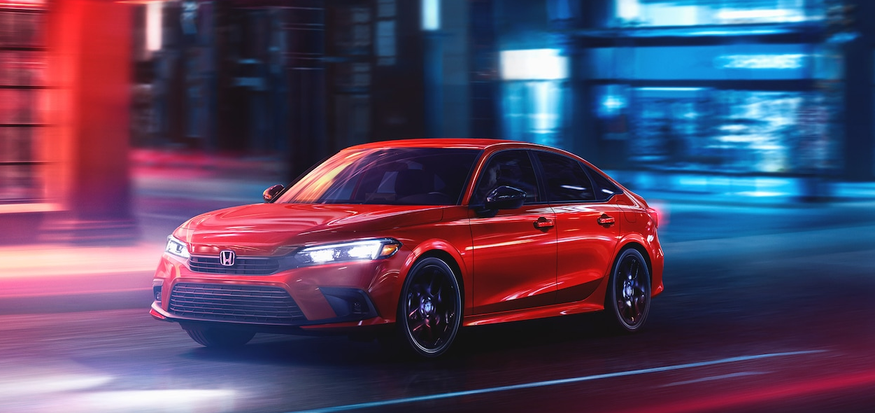 Red 2024 Honda Civic on the road