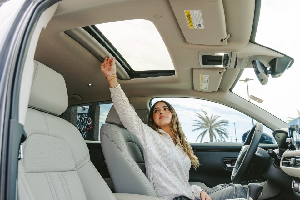 Woman in Honda Clark Knapp Honda in Pharr TX